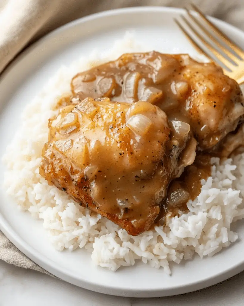 Southern Smothered Chicken Thighs with Gravy and Rice Recipe