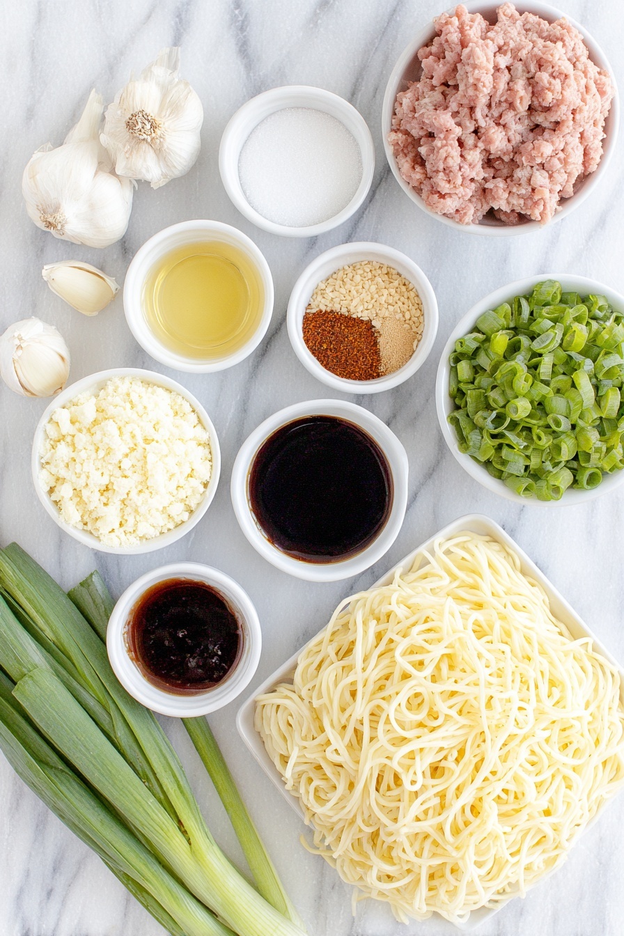 Flat lay of a small mound of thick, creamy Chinese sesame paste, a small white bowl of bright red chili paste in oil, a small white bowl of dark light soy sauce, two whole uncracked garlic cloves, a small white bowl of white granulated sugar, a small white bowl of earthy brown Chinese five spice powder, a small white bowl of finely ground reddish Sichuan pepper powder, a small white bowl of vibrant red chili oil, a small white bowl of golden chicken broth, a small white bowl of glossy dark hoisin sauce, a small white bowl of thick dark soy sauce, a small white bowl of pale golden Chinese cooking wine, a small white bowl of clear vegetable oil, a small portion of raw pink pork mince, a small pile of finely chopped deep green preserved mustard greens, a neat pile of fresh white medium-thickness wheat noodles (about 3mm thick), a bunch of fresh green choy sum stems cut into 15 cm sections, two whole green onions sliced thinly, and a small heap of coarsely chopped light brown peanuts, all arranged in perfect symmetry on simple white ceramic bowls and plates, placed on a clean white marble surface, soft natural light, photo taken with an iPhone, professional food photography style, fresh ingredients, white ceramic bowls, no bottles, no duplicates, no utensils, no packaging --ar 2:3 --v 7 --p m7354615311229779997 - Easy Dan Dan Noodles with Pork and Sesame, Dan Dan Noodles recipe, spicy noodle dishes, quick Asian dinner, sesame pork noodles
