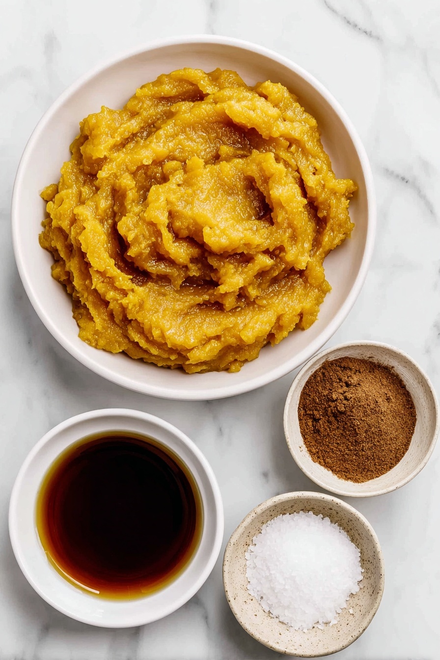 Flat lay of two small white ceramic bowls, one filled with bright orange pumpkin puree, the other containing amber maple syrup, a small white bowl of golden apple cider, a small white bowl holding a dark brown cinnamon powder, a small white bowl with warm brown pumpkin pie spice, and a small white bowl with coarse kosher salt, all arranged in perfect symmetry on a clean white marble surface, soft natural light, photo taken with an iPhone, professional food photography style, fresh ingredients, white ceramic bowls, no bottles, no duplicates, no utensils, no packaging --ar 2:3 --v 7 --p m7354615311229779997 - Spiced Pumpkin Butter, pumpkin butter recipe, fall pumpkin spread, cozy pumpkin preserves, homemade pumpkin spread
