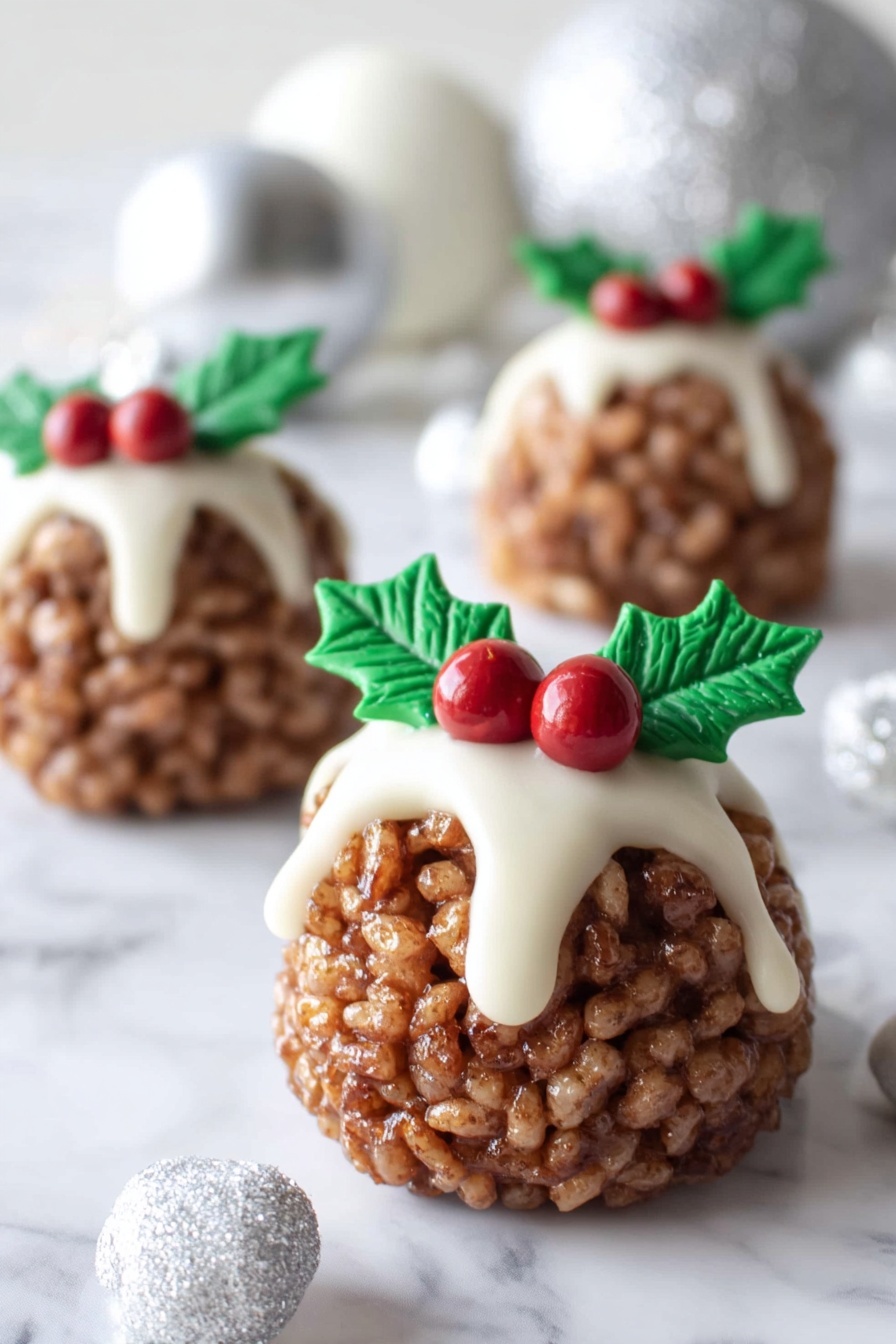 The image shows five round, brown crispy balls made from puffed cereal, each topped with a white icing layer that drips slightly down the sides. On top of the icing, there is a decoration of two green holly leaves and three small red berries made from fondant or icing, creating a festive look. The balls are placed on a white marbled surface, surrounded by white and silver Christmas ornaments, adding a holiday feel to the scene. The lighting is bright and soft, highlighting the texture of the cereal and the smoothness of the icing. photo taken with an iphone --ar 2:3 --v 7 - Chocolate Rice Krispie Christmas Puddings, festive holiday treats, easy Christmas dessert, no-bake holiday sweets, fun Christmas baking ideas