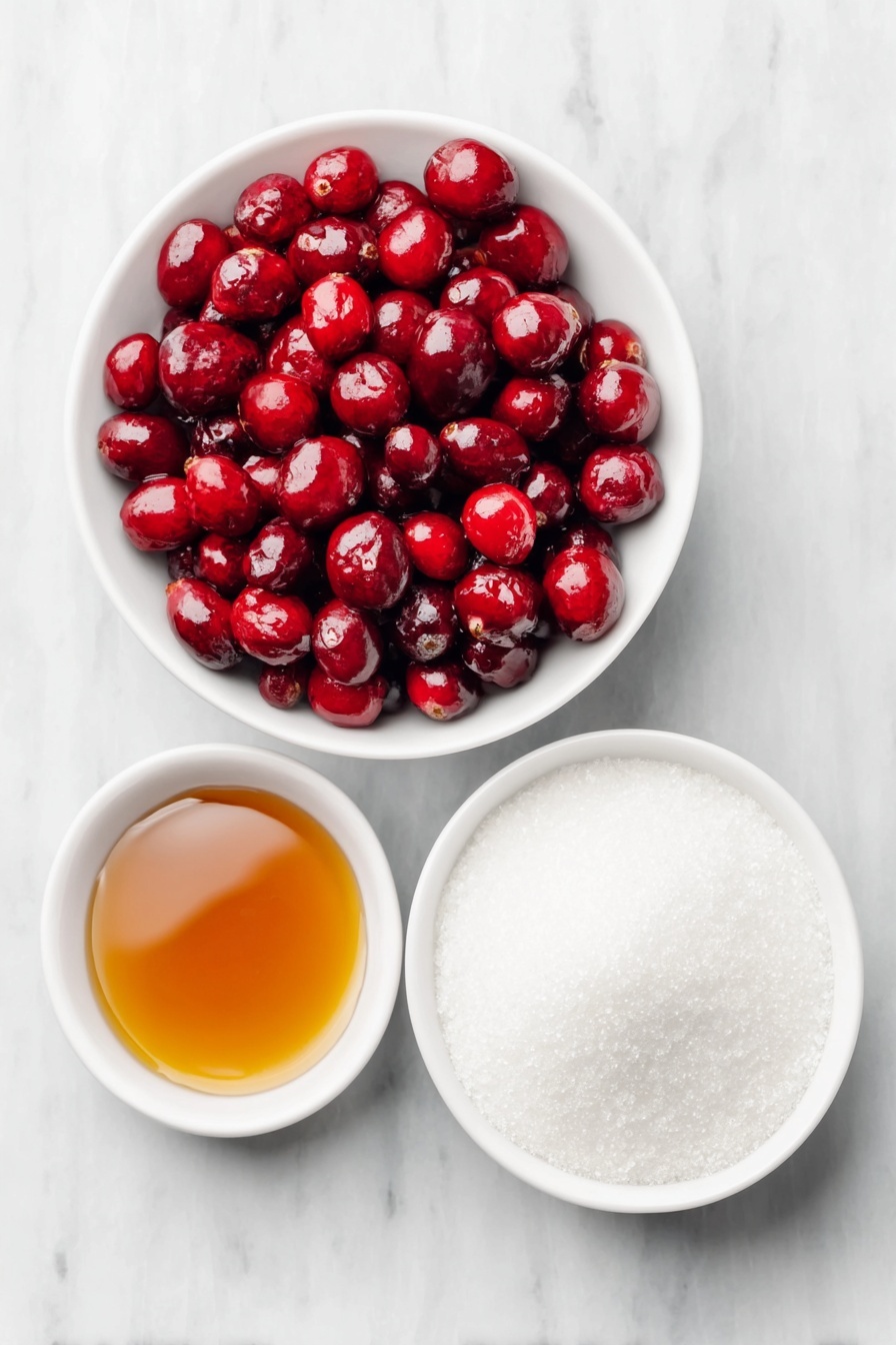 Flat lay of a small white ceramic bowl filled with glossy pure maple syrup, a medium white ceramic bowl of vibrant fresh red cranberries, a larger white ceramic bowl heaped with fine white granulated sugar, arranged with perfect symmetry and balanced proportions, all ingredients looking fresh and natural, placed on a clean white marble surface, soft natural light, photo taken with an iPhone, professional food photography style, fresh ingredients, white ceramic bowls, no bottles, no duplicates, no utensils, no packaging --ar 2:3 --v 7 --p m7354615311229779997 - Sparkling Cranberries, festive cranberries, holiday cranberry snacks, sparkling berry desserts, easy holiday treats