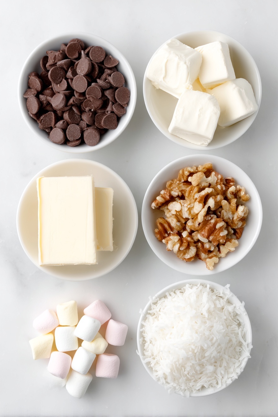 Flat lay of a small pile of glossy semisweet chocolate chips, several cubes of pale yellow butter, a scattered handful of pastel miniature marshmallows in soft pink, white, and yellow hues, a small mound of toasted chopped walnuts with a golden-brown tone, and a neat pile of white flaked coconut, all arranged separately in simple white ceramic bowls or directly on the surface, placed on a clean white marble surface, soft natural light, photo taken with an iPhone, professional food photography style, fresh ingredients, white ceramic bowls, no bottles, no duplicates, no utensils, no packaging --ar 2:3 --v 7 --p m7354615311229779997 - Easy Church Window Cookies, colorful no-bake cookies, nostalgic dessert recipes, chocolate marshmallow treats, festive holiday cookies