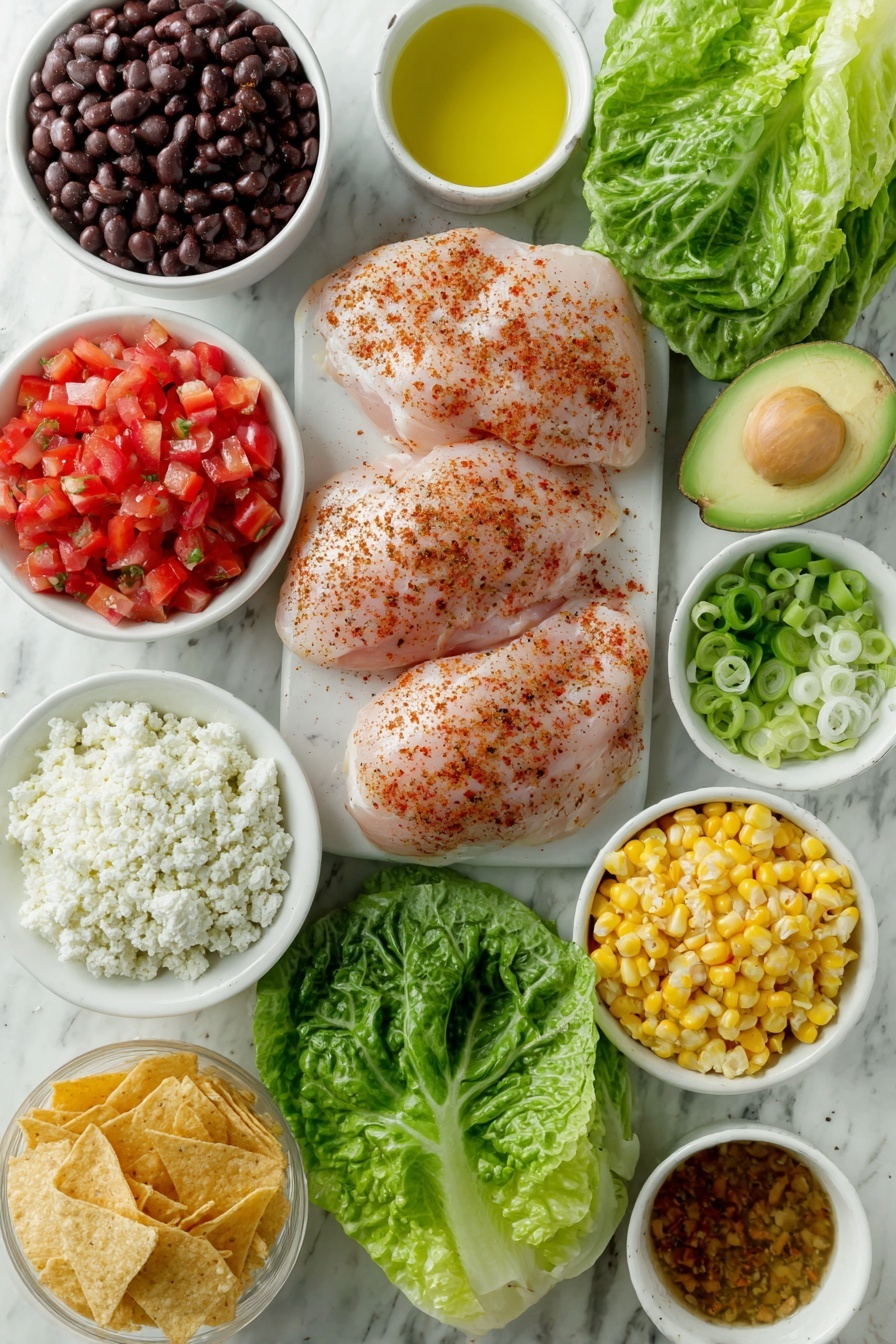 Flat lay of fresh boneless skinless chicken breasts seasoned with a mix of garlic powder, onion powder, smoked paprika, black pepper, salt, and chipotle powder in a small white ceramic bowl, a small white bowl of golden olive oil, vibrant green romaine lettuce leaves, a small white bowl of cooked black beans, a small white bowl of thawed bright yellow corn kernels, a whole shiny red bell pepper, a small white bowl filled with chopped ripe red tomatoes, a fresh green jalapeño pepper, two fresh green onions with white bulbs, a small white bowl holding crumbled white cotija cheese, a small white bowl with cooked fluffy quinoa, a perfectly ripe halved avocado showing its green flesh and pit, a small white bowl with broken golden tortilla chips, and a small white bowl containing chipotle honey vinaigrette ingredients: freshly squeezed lime juice, light olive oil, chopped chipotle peppers in adobo, chopped cilantro leaves, dried oregano powder, salt, a whole garlic clove, a drizzle of honey, water, and white vinegar — all arranged with perfect symmetry and balanced proportions in simple white ceramic bowls without packaging or utensils, placed on a clean white marble surface, soft natural light, photo taken with an iPhone, professional food photography style, fresh ingredients, white ceramic bowls, no bottles, no duplicates, no utensils, no packaging --ar 2:3 --v 7 --p m7354615311229779997 - Santa Fe Chicken Salad, healthy chicken salad, spicy chicken salad, colorful veggie salad, easy summer salad