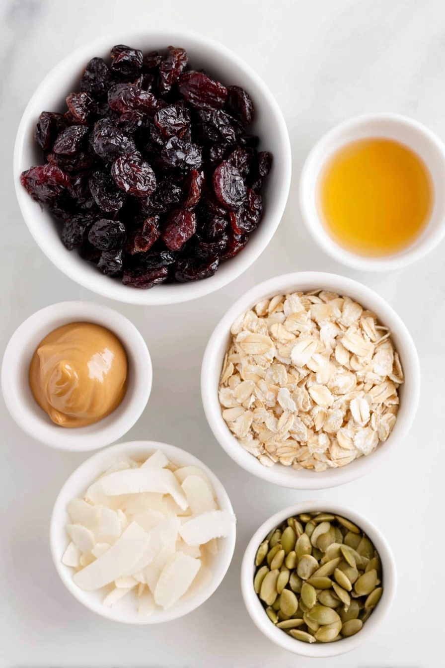 Flat lay of dried cranberries in a small white ceramic bowl, sliced almonds loosely piled next to them, a small white bowl filled with amber maple syrup, creamy peanut butter softly scooped in another small white bowl, a neat pile of unsweetened coconut flakes, raw pumpkin seeds arranged in a small white bowl, gluten-free rolled oats spread in a simple white ceramic bowl, all ingredients fresh and natural, perfectly symmetrical layout placed on a clean white marble surface, soft natural light, photo taken with an iPhone, professional food photography style, fresh ingredients, white ceramic bowls, no bottles, no duplicates, no utensils, no packaging --ar 2:3 --v 7 --p m7354615311229779997 - Pumpkin Seed Cranberry Energy Balls, healthy energy bites, nutritious snack recipes, easy no-bake energy snacks, vegan berry snack ideas